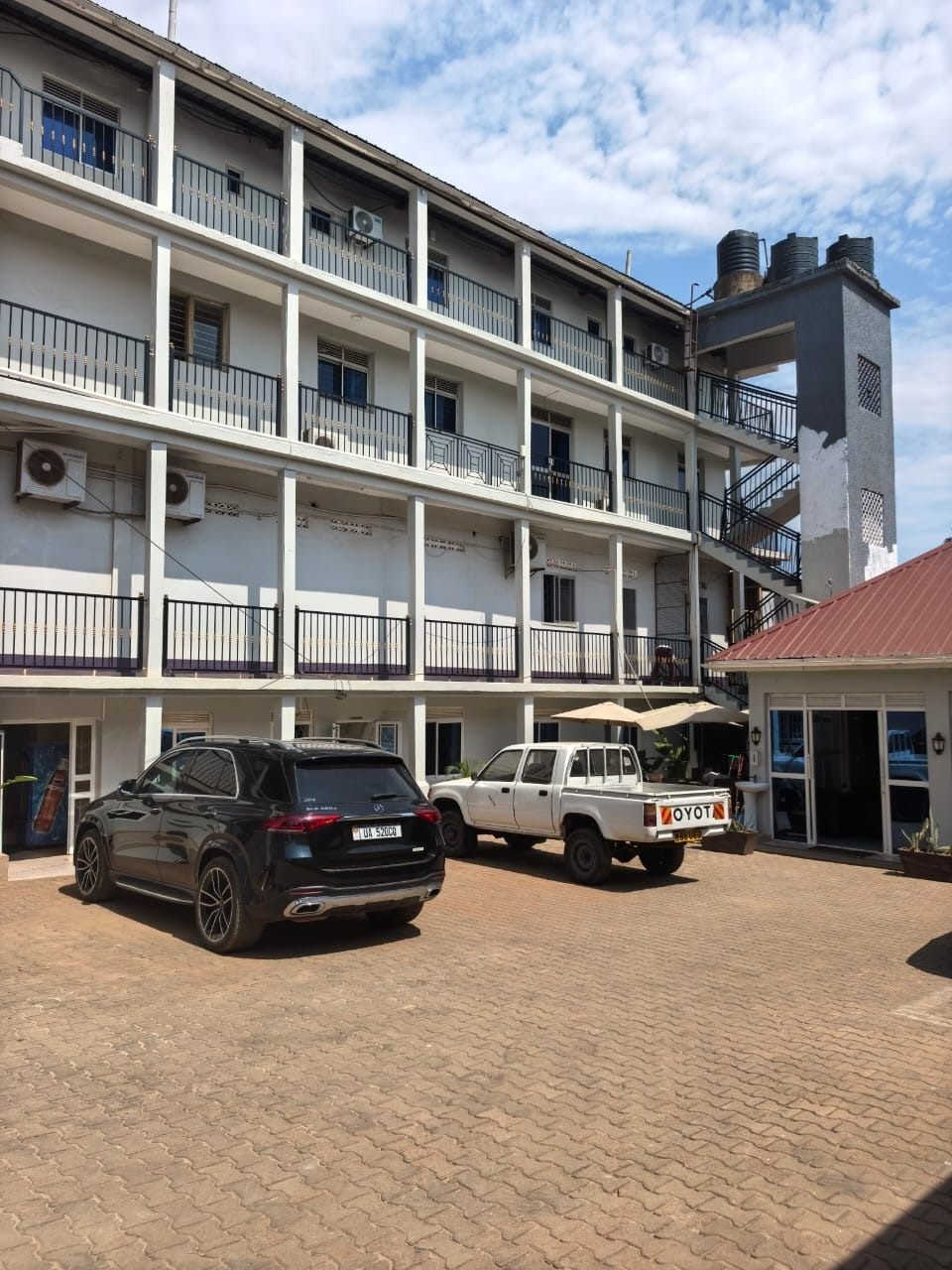 Guest balconies and courtyard at KAA Highway Hotel, Mukono